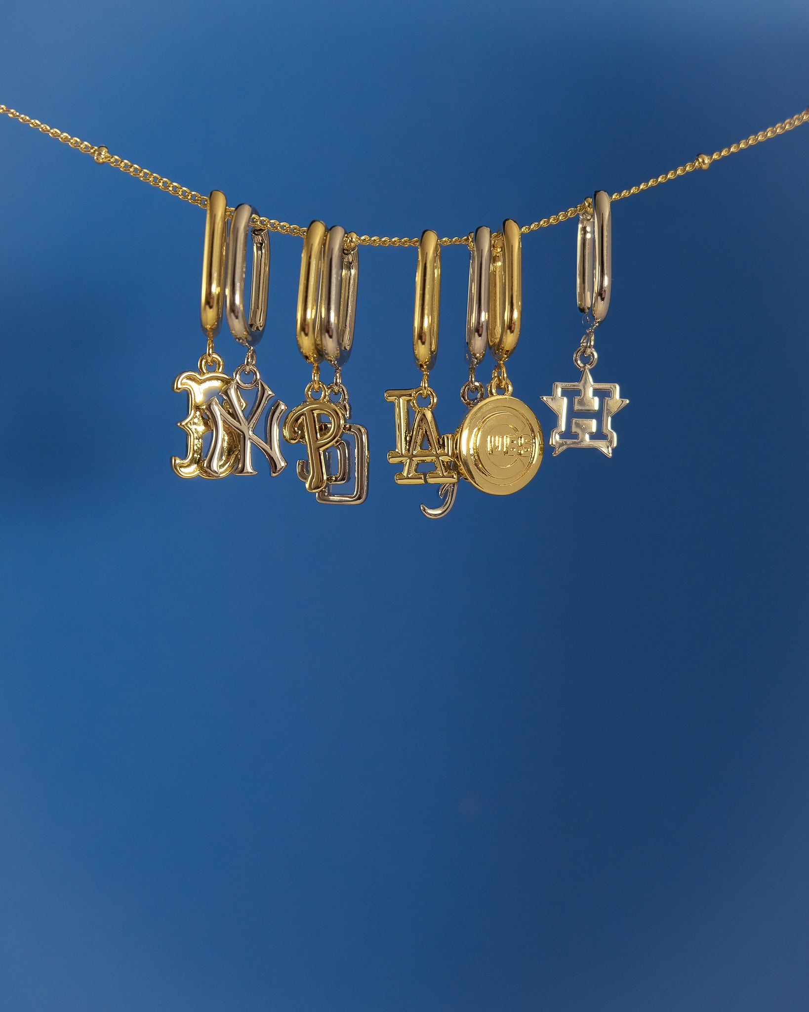 The MLB Logo Charm Oval Hoop Earrings- Gold